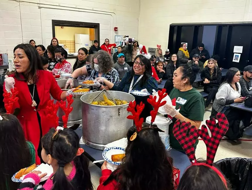 D45 staff members served students tamales