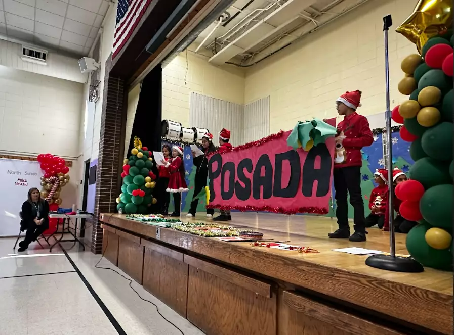 Students perform on stage