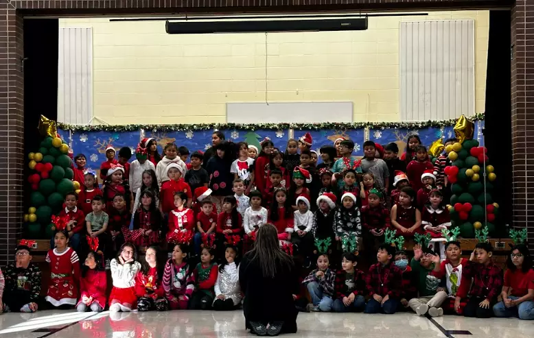 Student performers proudly pose for a picture