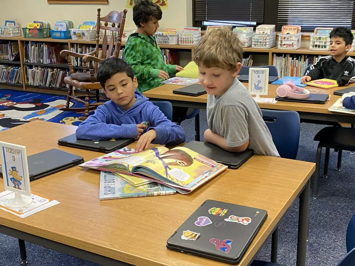 Second graders read through the Monarch nominated books.