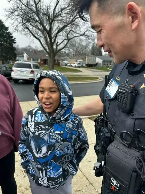 Sgt. Lee gives a third grader a pep talk.