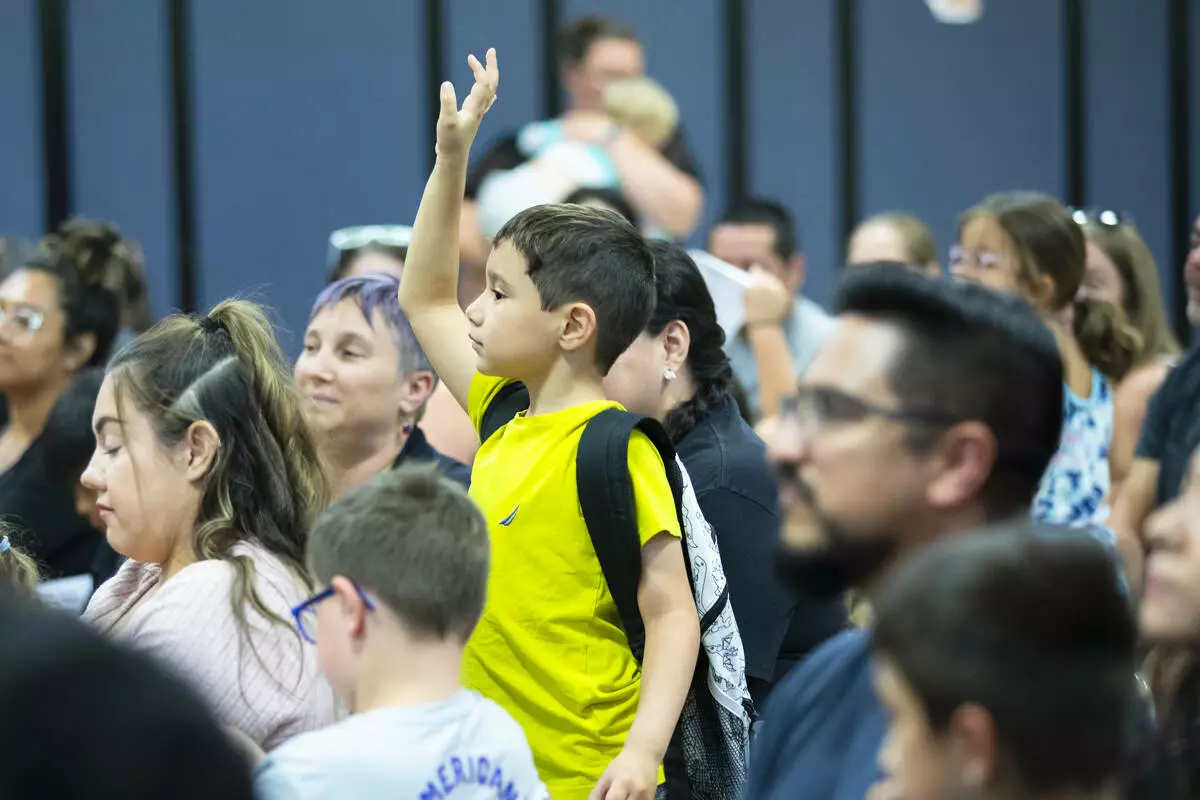 Students were eager to ask questions about the animals that Cosely Zoo showcased. 