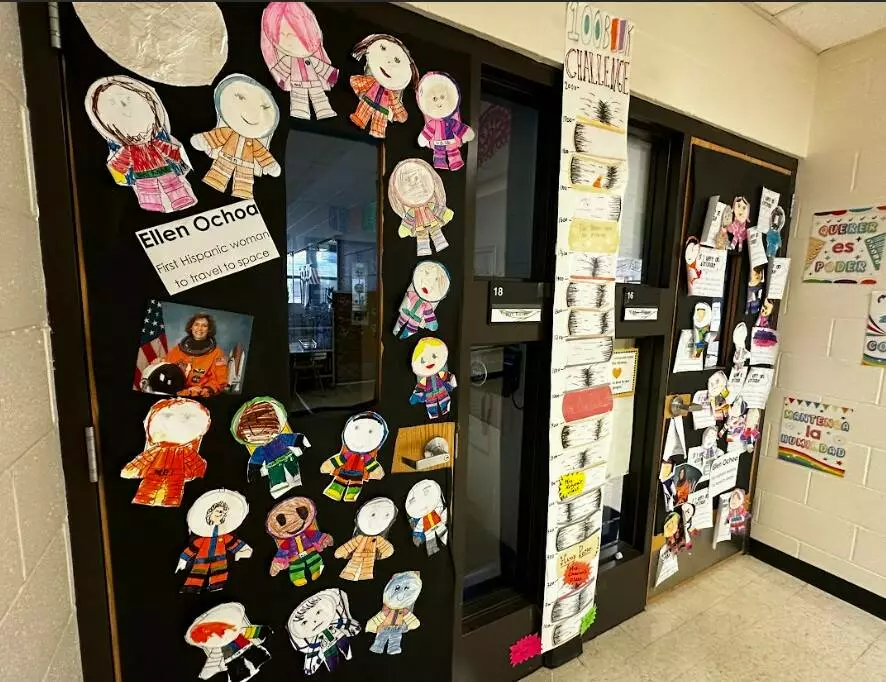 Two doors are decorated in honor of Ellen Ochoa, the first Latina woman to travel to space. 