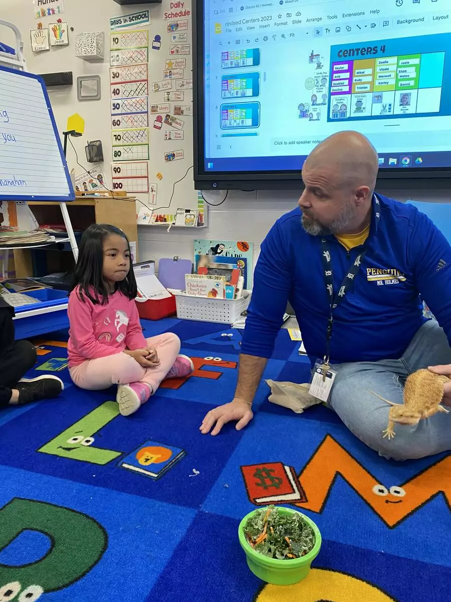 Mr. Holmes answers student questions about Puff. 