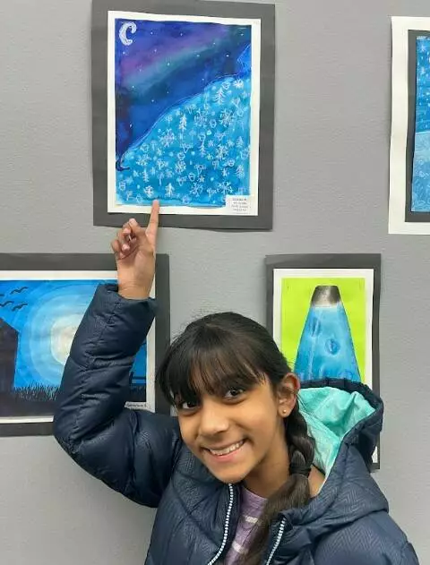 A North student shows off her beautiful artwork!