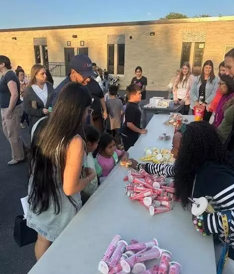 Families enjoyed ice cream together at the closing of the event. 
