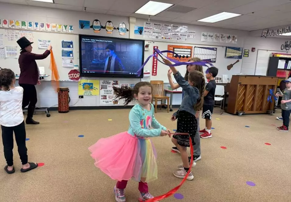 Children were moving and grooving in the Music Room.