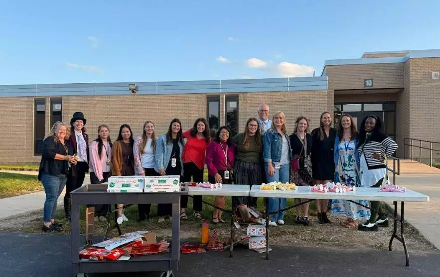 Staff closed the evening by handing out sweet treats for our families to enjoy together on our back playground. 
