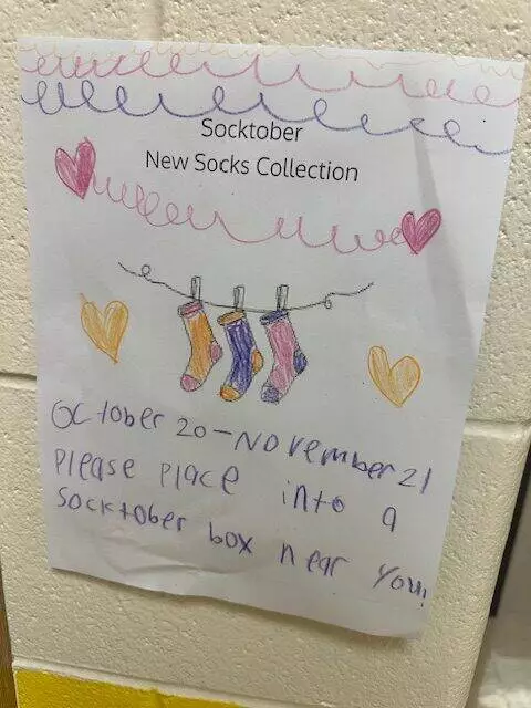 Signs were put up around the school to advertise the collection. 